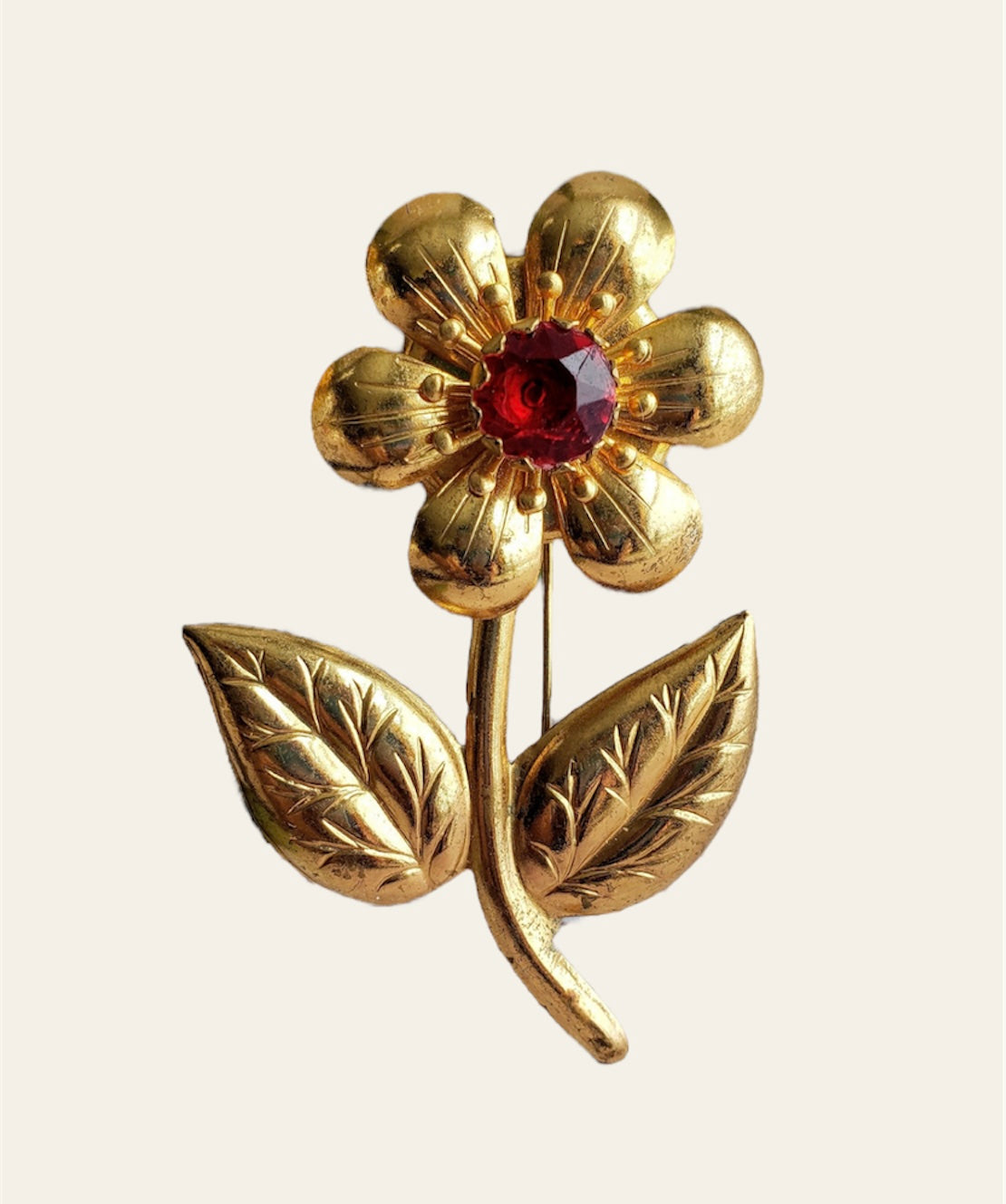 Metal flower store brooch