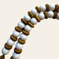 Les Bernard White And Gold Beaded Necklace